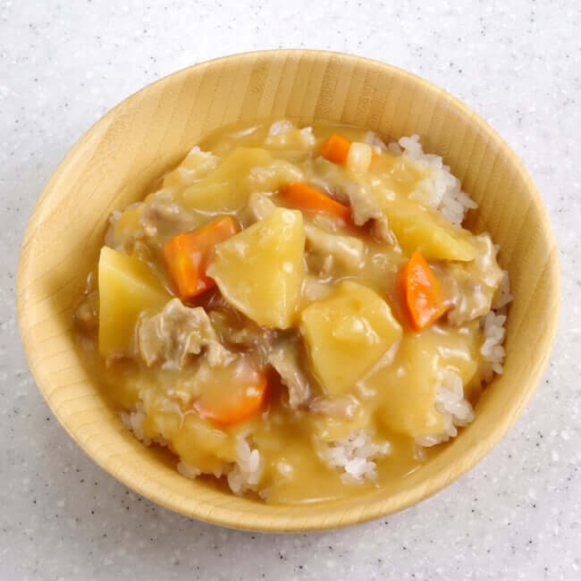 A classic bowl of Japanese curry rice with meat and vegetables